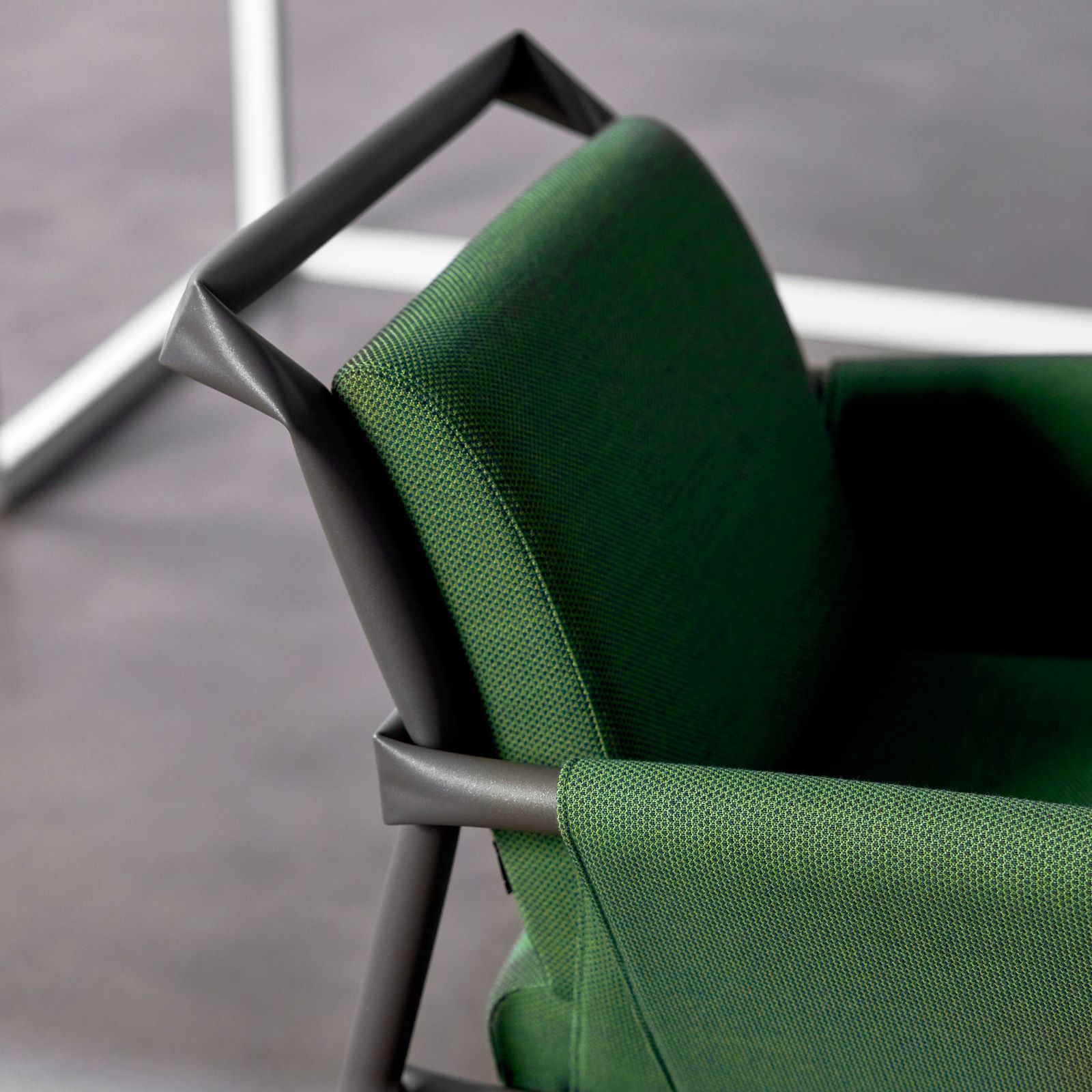 Een groen beklede stoel met het stof van Svensson