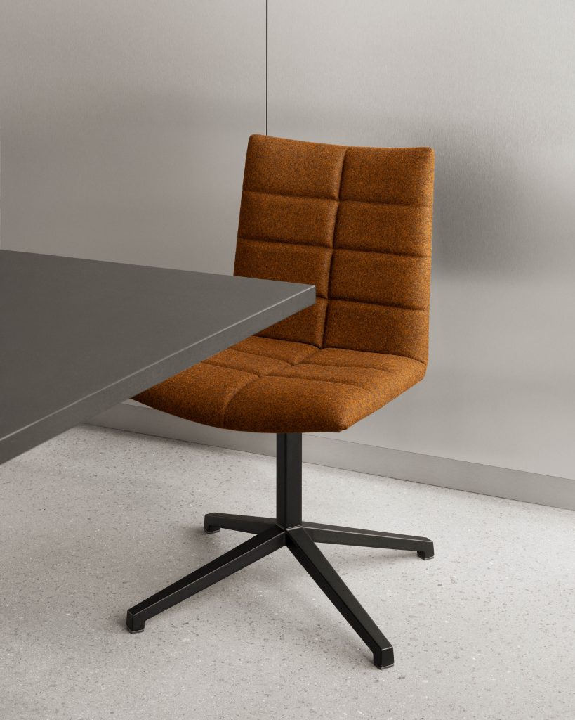 Grijze ruimte met grijze eettafel en oranje stoel met zwarte frame van Lammhults