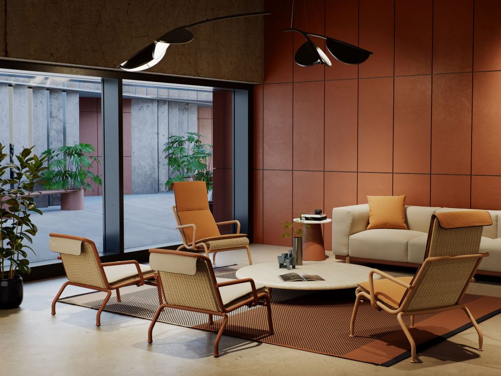 Ruimte met oranje wand, grijze bank, stoelen en witte ronde tafel.